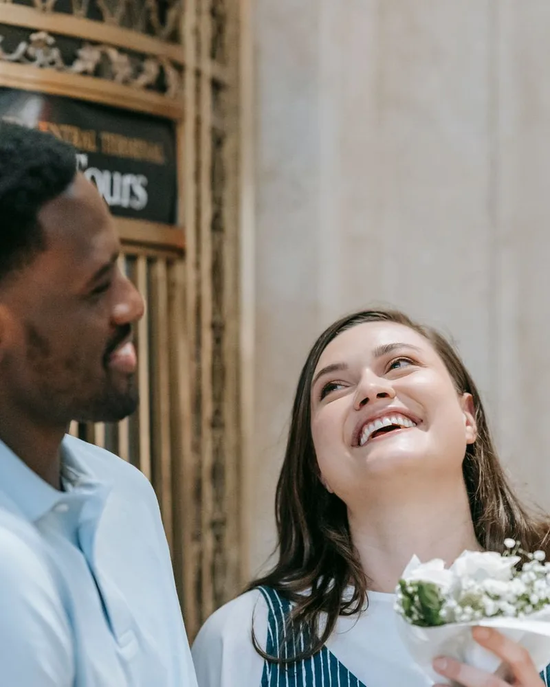 Two friends laughing together